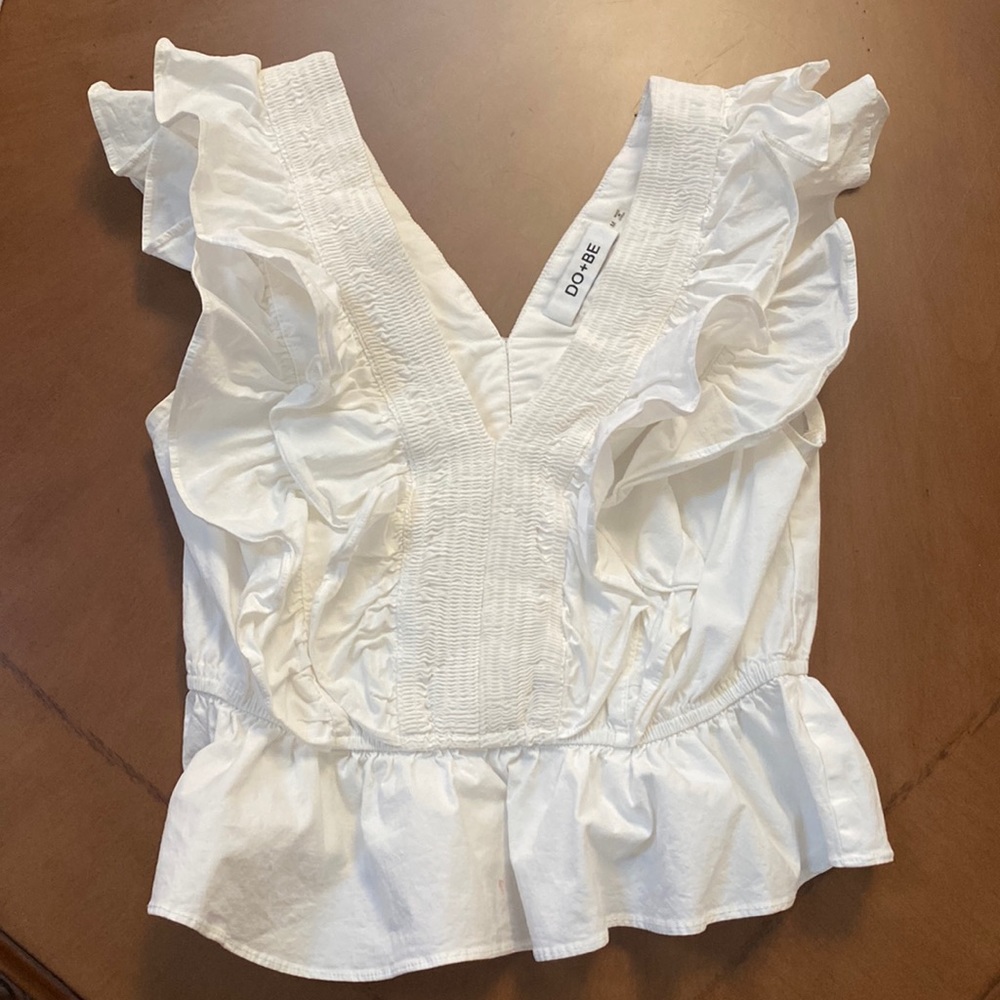 Do Be white top with ruffles.  Excellent condition.